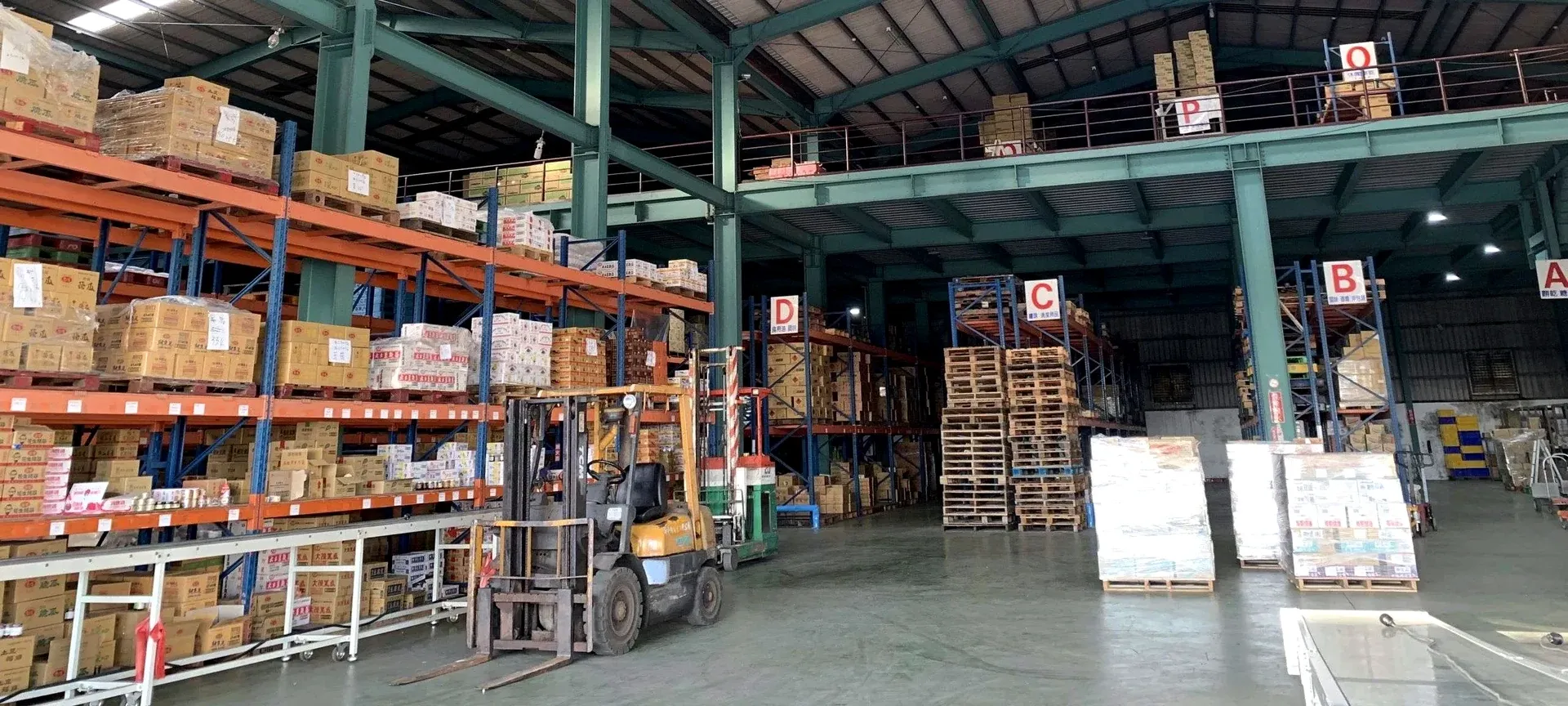 Existing real-world view of Golden Sun's warehouse, racking and forklift